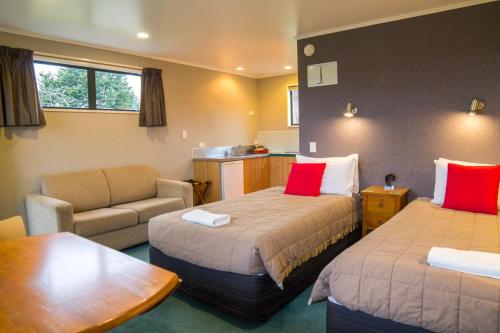 Te Anau Lakeview Holiday Park & Motelsにあるベッド