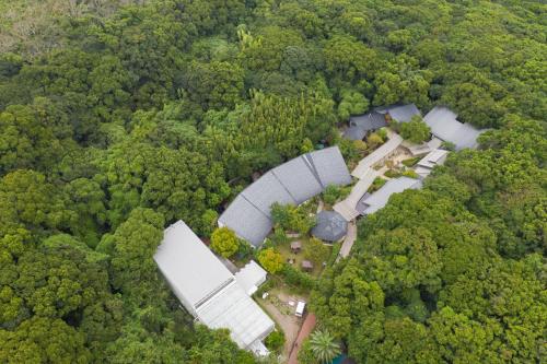 an aerial view of a house in the woods at Mori no Nanakusa in Munakata
