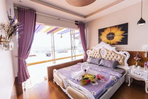 Postel nebo postele na pokoji v ubytování Tà Đùng Topview Homestay