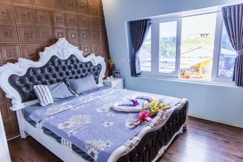 Postel nebo postele na pokoji v ubytování Tà Đùng Topview Homestay