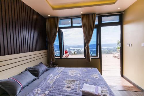 Postel nebo postele na pokoji v ubytování Tà Đùng Topview Homestay