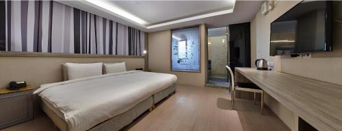 Μια τηλεόραση ή/και κέντρο ψυχαγωγίας στο Yuhao Hotel - Hsinchu Branch