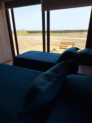 Postel nebo postele na pokoji v ubytování Sirena Lodge