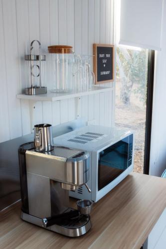 a kitchen with a coffee maker on a counter at Djindarup Retreat 4 by Tiny Away in Margaret River Town