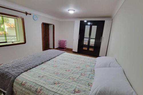 Postel nebo postele na pokoji v ubytování Casa Céntrica en Cusco