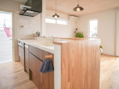Dapur atau dapur kecil di 新築サーファーズハウス棟貸しFLAG Awaji