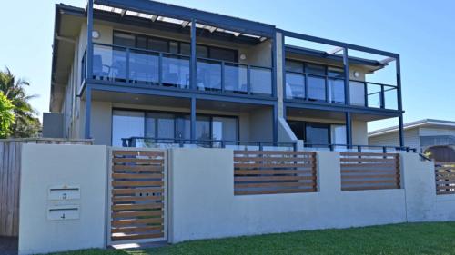 an image of a house with a fence at Sea Breeze in Old Bar