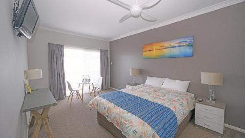Ένα ή περισσότερα κρεβάτια σε δωμάτιο στο Apartment 31 - The Meridian