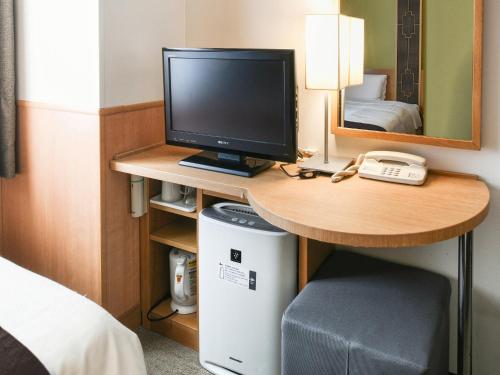 A television and/or entertainment centre at Vessel Inn Hakata Nakasu