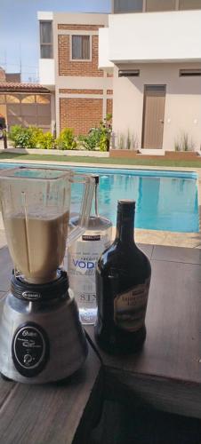 a blender sitting on a table next to a drink at Casa Los Agaves in Zapotlanejo