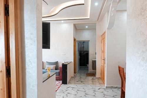 a hallway of a house with a living room at Appartement familial in Dakhla