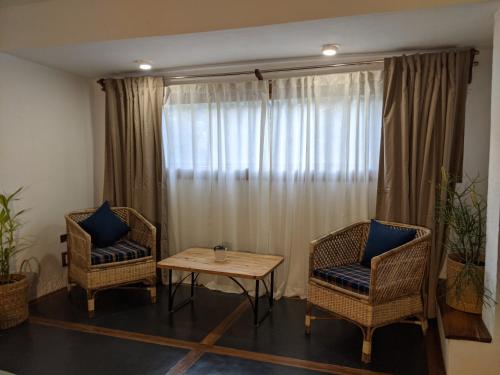Χώρος καθιστικού στο Kengbari Retreat
