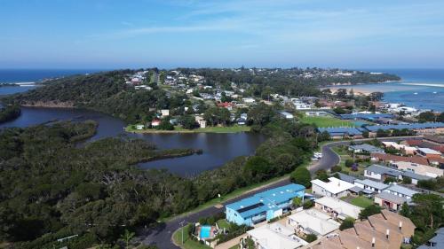 an aerial view of a town and a body of water at BlueWater Apartments in Merimbula