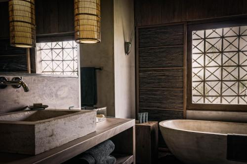 Ein Badezimmer in der Unterkunft Zannier Phum Baitang