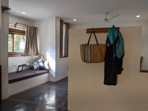 Ένα ή περισσότερα κρεβάτια σε δωμάτιο στο Kengbari Retreat
