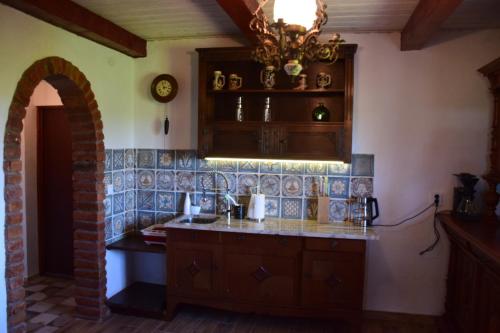 Kuchyň nebo kuchyňský kout v ubytování RUSTIC MAID´S ROOM