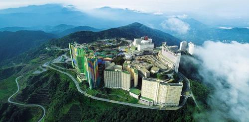 a large city on top of a mountain in the clouds at Family room in Genting Highlands in Genting Highlands