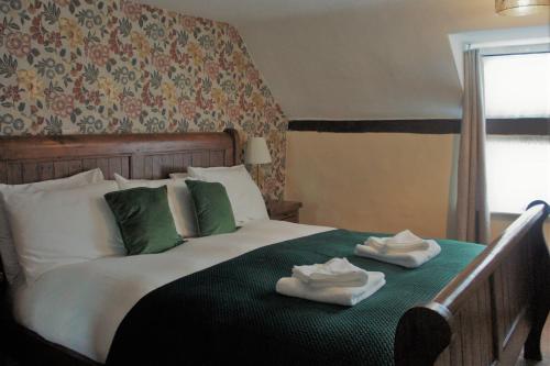 Postelja oz. postelje v sobi nastanitve Star Inn Hotel