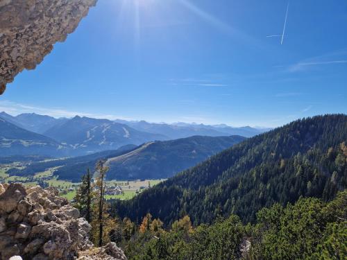 a view from the top of a mountain at Romantikapartment mit Sommercard in Ramsau am Dachstein