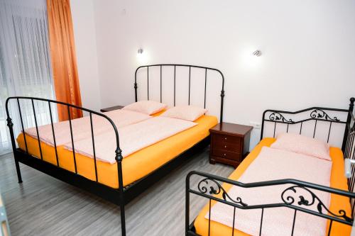 Ένα ή περισσότερα κρεβάτια σε δωμάτιο στο Villa Jajce
