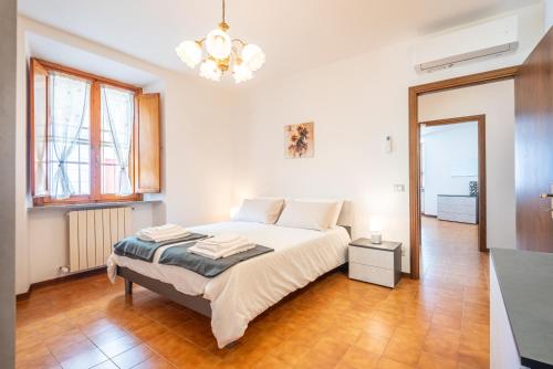 Ένα ή περισσότερα κρεβάτια σε δωμάτιο στο Casa Ida