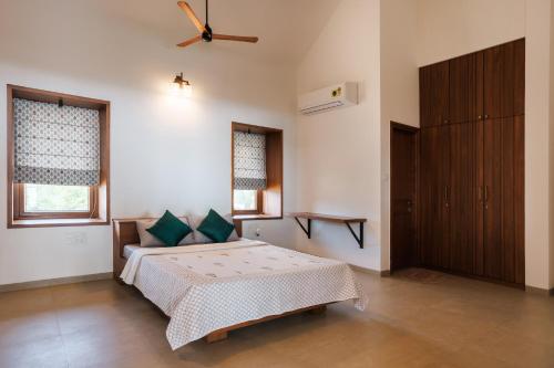 Ένα ή περισσότερα κρεβάτια σε δωμάτιο στο Villa Lahari by EWA Properties