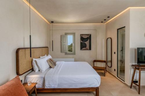 Кровать или кровати в номере Peranosa the Residency