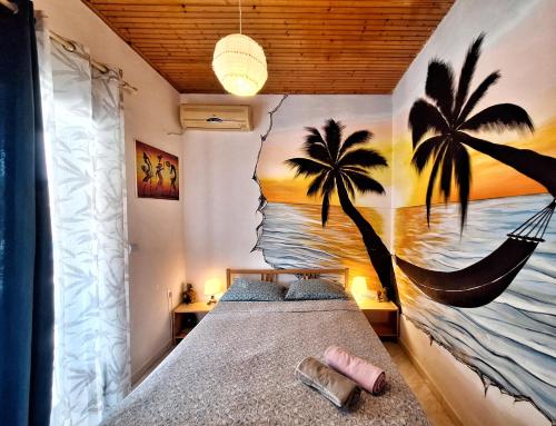 Postel nebo postele na pokoji v ubytování LeMaMi Seafront Bungalows