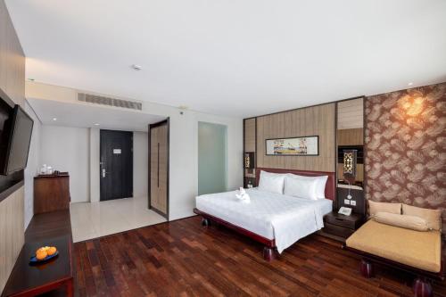 Postel nebo postele na pokoji v ubytování Sanur Resort Watujimbar