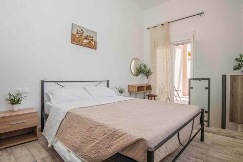 Postel nebo postele na pokoji v ubytování Villa Zoi