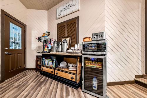 a kitchen with a counter with a stove at Americas Best Value Inn Marquette in Marquette