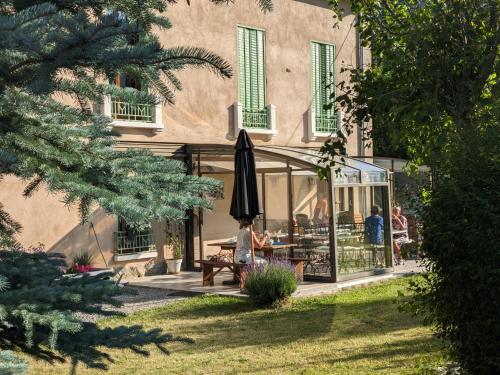 En have udenfor Chambre d'Hotes La Mexicaine