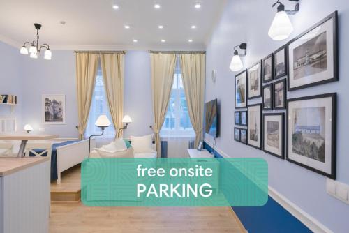 a rendering of a living room with the words free outside parking at Revelton Suites Tallinn in Tallinn