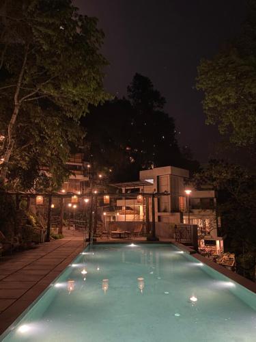 Πισίνα στο ή κοντά στο Kengbari Retreat