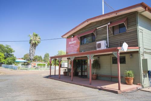 a building with a sign on the side of it at Discovery Parks - Mt Isa in Mount Isa
