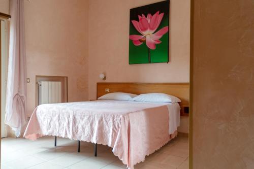 Ένα ή περισσότερα κρεβάτια σε δωμάτιο στο I Lecci Guesthouse