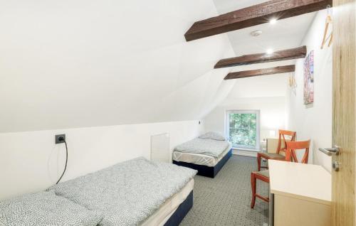 Кровать или кровати в номере Alpaka Ferienhaus Schmatzin