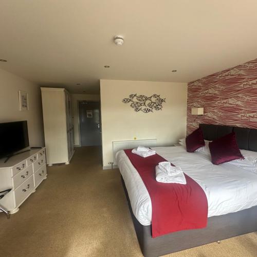 Waveney Inn & Hotelにあるベッド
