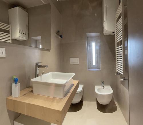 Koupelna v ubytování la casa del porto