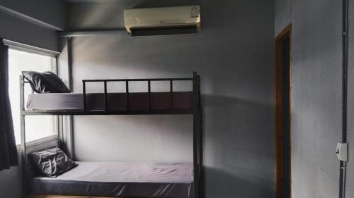 Postel nebo postele na pokoji v ubytování Youyen Hostel
