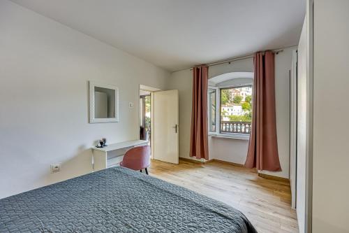 Postel nebo postele na pokoji v ubytování Apartment Riva 1001