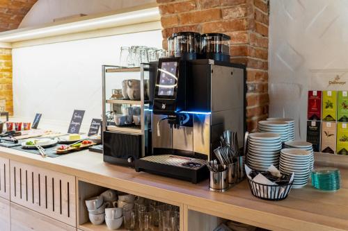 a coffee maker on a counter in a kitchen at Aparthotel Bad Radkersburg in Bad Radkersburg