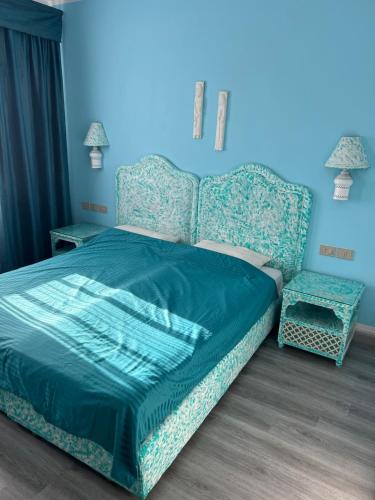 Ein Bett oder Betten in einem Zimmer der Unterkunft Domina coral bay