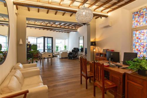 a living room with a couch and a table at Hotel Elite in Rome