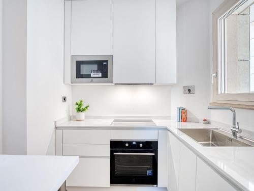 Η κουζίνα ή μικρή κουζίνα στο Luxury Residence Oikos - Apartment with Parking