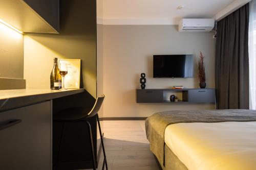 Letto o letti in una camera di Prishtina City Apartments