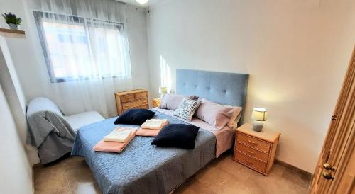 Postel nebo postele na pokoji v ubytování Sunny Apartment