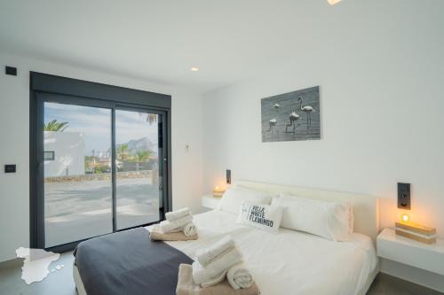 Postel nebo postele na pokoji v ubytování CostaBlancaDreams Villa White Flamingo in Calpe