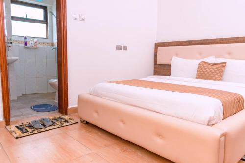 Ένα ή περισσότερα κρεβάτια σε δωμάτιο στο Havan Furnished Apartment-Shawmut