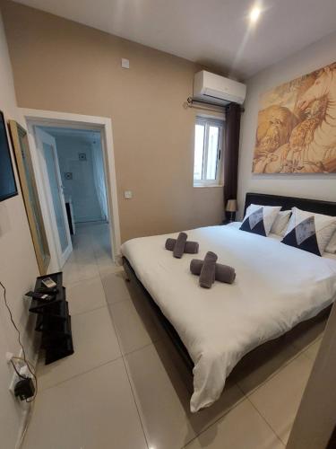 Postel nebo postele na pokoji v ubytování Central & Cozy - 1 Bedroom Apartment